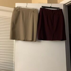 4 skirts with pockets. Colors: burgundy, tan, navy blue, & gray.